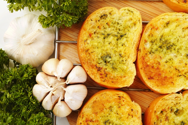 Chowing down on garlic bread could give you bad breath for hours afterward. 