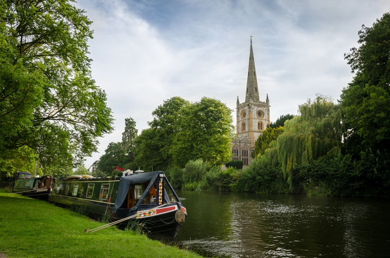 Holy Trinity Church looks over the tranquil River Avon in the centre of Stratford-upon-Avon. 